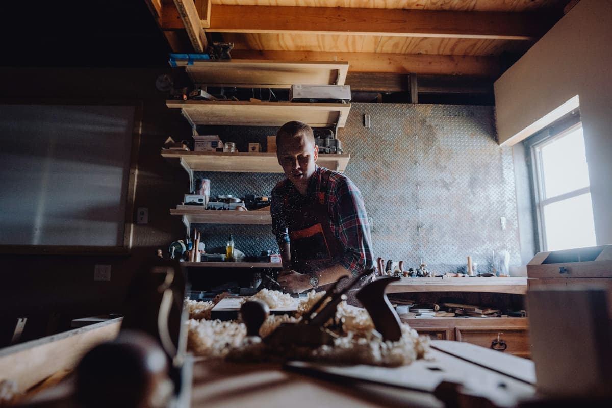 A woodworker at the bench in a workshop